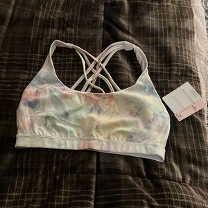 Victoria’s Secret Sports Bra. Strappy back design. Water print color pattern.
